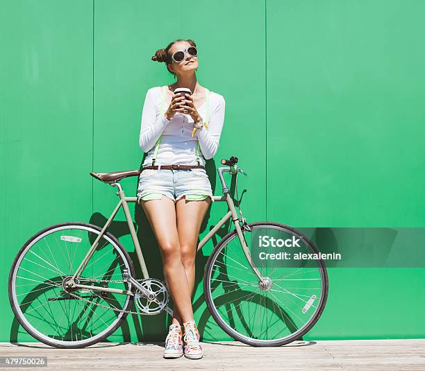 Fashionable Girl In Shorts Stands With Bicycle Fix Gear Stock Photo - Download Image Now