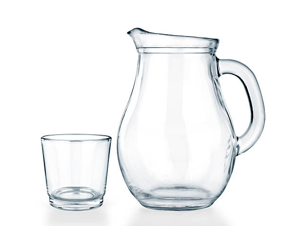 Empty jug and glass Empty jug and glass on a white background. quench your thirst pictures stock pictures, royalty-free photos & images