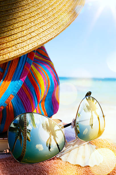 istock art Straw hat and sun glasses  on a tropical beach 479753516