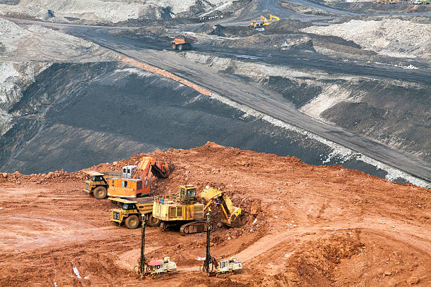 istock Part of a pit with big mining truck working 479759092