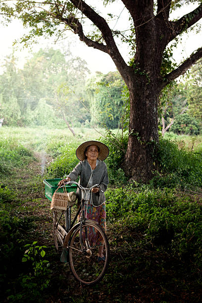 istock Grandmother on bikes at the country side 479762534