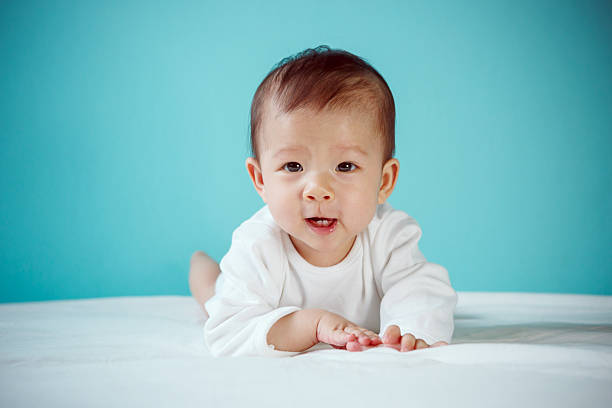 istock Baby girl looking away, studio shot 479762608