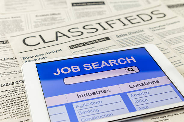 istock Searching job with tablet and classifieds ads 479762722