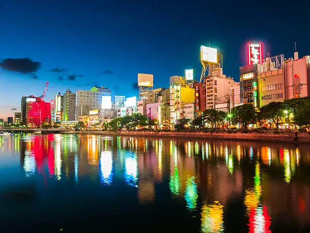 Fukuoka Evening scene along the riverside with lights reflected in the water