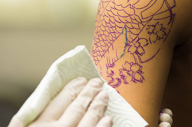 istock Tattoo artist wiping 479768134