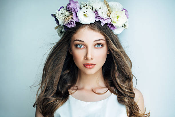 istock Beautiful girl with flower wreath 479771616
