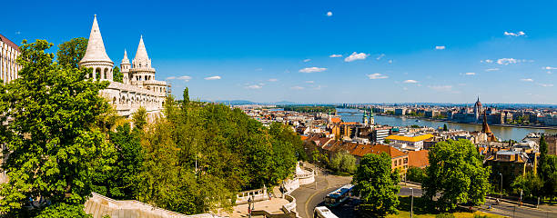 Riverfront cityscape in Budapest, Riverfront cityscape in Budapest, Hungary in the early morning fishermens bastion photos stock pictures, royalty-free photos & images