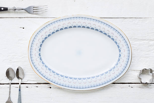 istock Beautiful old dessert plate, fork and spoons 479774818