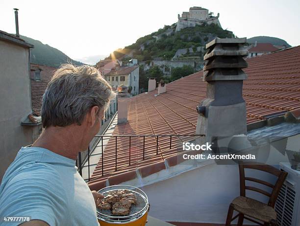 Man Takes Selfie Barbecuing On A Rooftop In Liguria Italy Stock Photo - Download Image Now