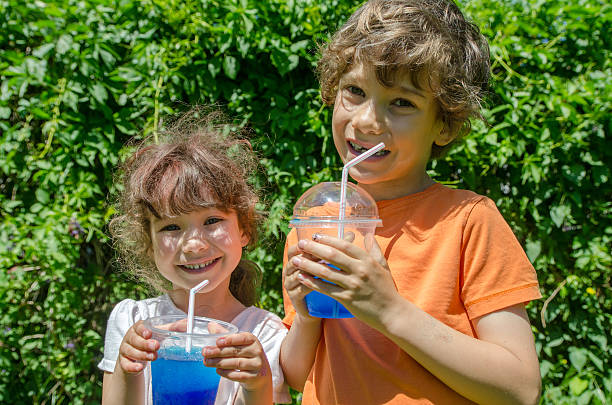 istock Boy and girl drinking slush 479783254