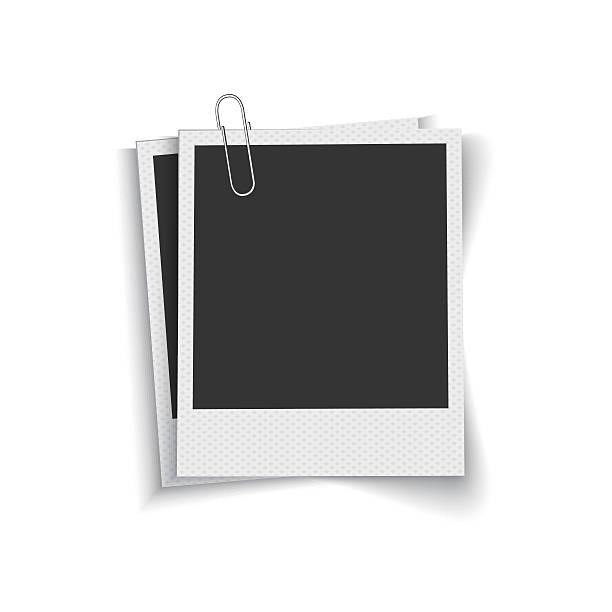 Blank photo frames with paper clip This image was made by Adobe Illustrator 10 bent photos stock illustrations
