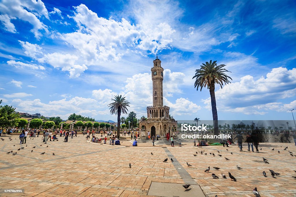 Clock tower in  Izmir - stock image Izmir Konak square with Historical Clock Tower-Saat Kulesi . It was built in 1901, in order to commemorate the 25th anniversary of Abdulhamid II accession to the throne. The tower is 25 metres high and has 4 fountains around the circular base. It is a the symbol of Izmir City. Izmir Stock Photo