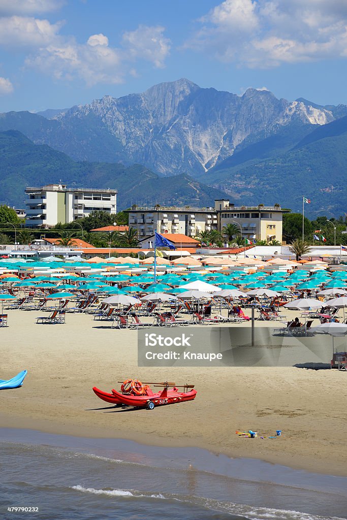 Beach resort in tuscany italy with marble mountains in background 2015 Stock Photo