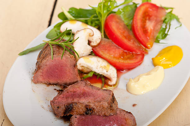 istock beef filet mignon grilled with vegetables 479798372