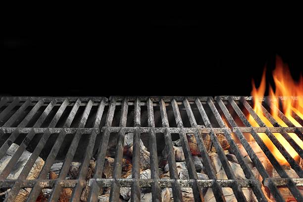 Flaming BBQ Charcoal Grill Close-up Background stock photo