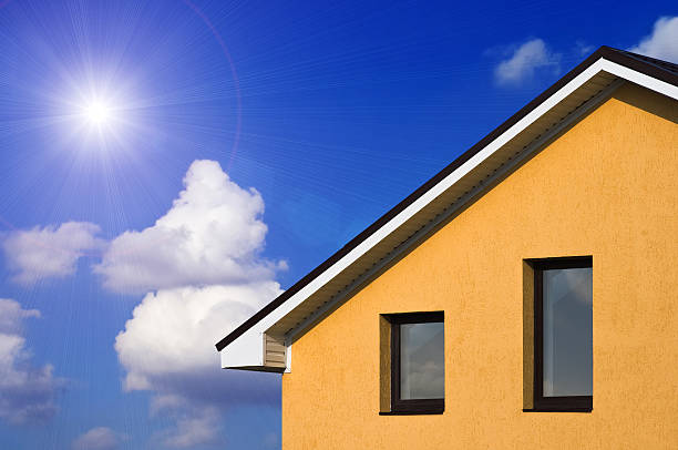 Abstract house facade under the blue sky stock photo