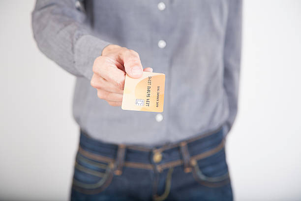 istock woman hands offering credit card 479801518