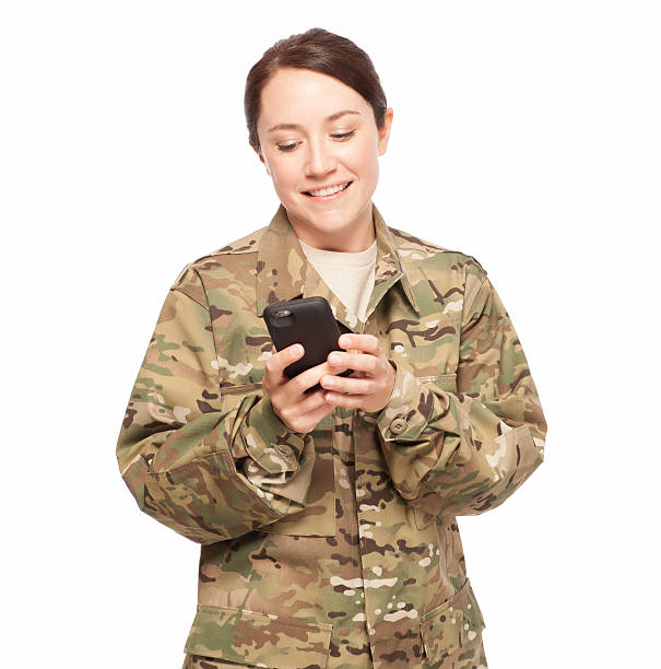 istock Female soldier on cell phone. 479804166