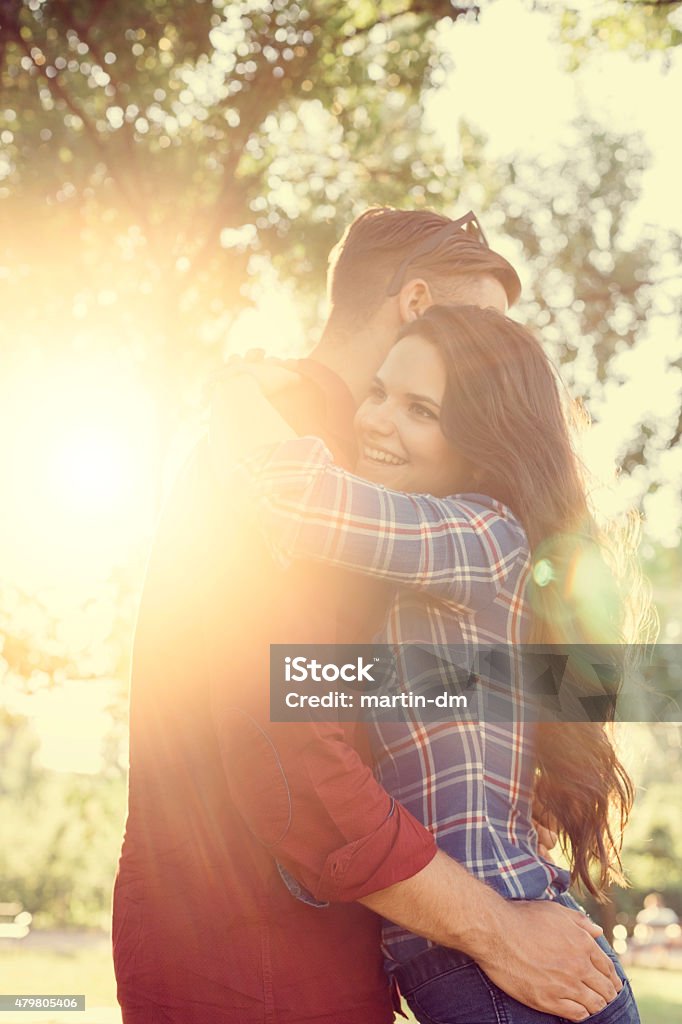 Young couple in the park Young people outside 20-24 Years Stock Photo