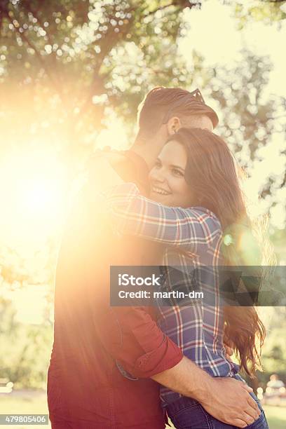 Young Couple In The Park Stock Photo - Download Image Now - 20-24 Years, 2015, Adolescence