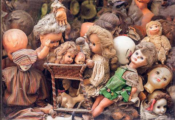istock Window with old toys and puppets. 479805964