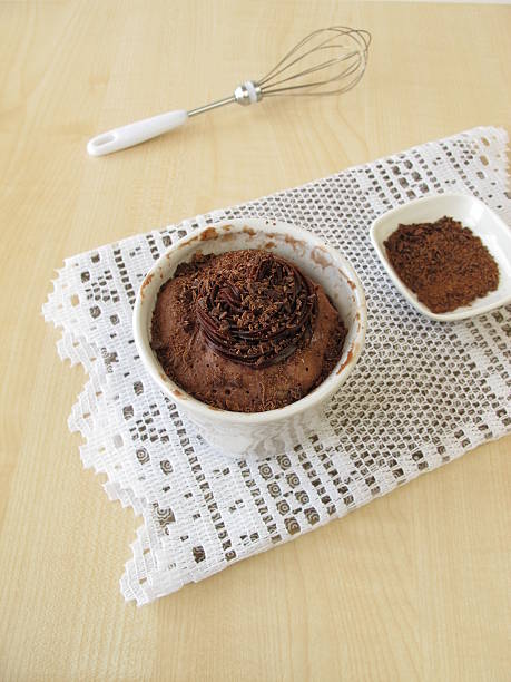 istock Nougat mug cake with chocolate cream topping chocolate sprinkles 479807044