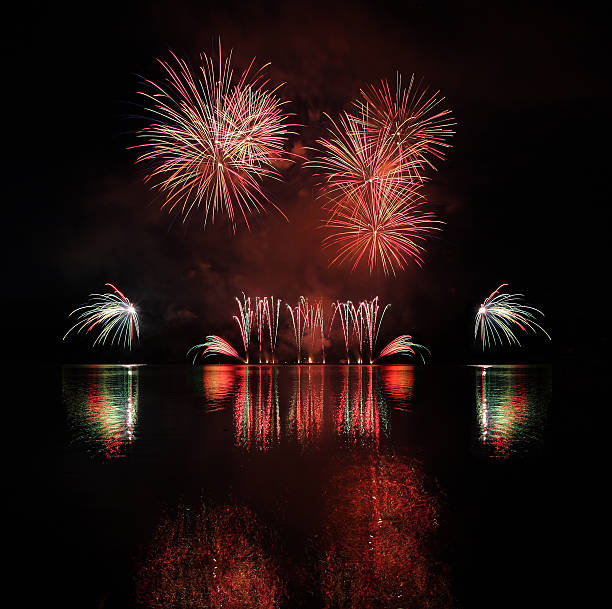istock Colorful fireworks with reflection on lake. 479810216