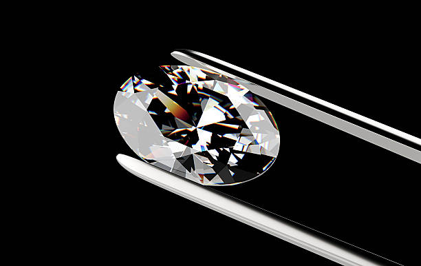 istock Diamond in the tweezers 479814542