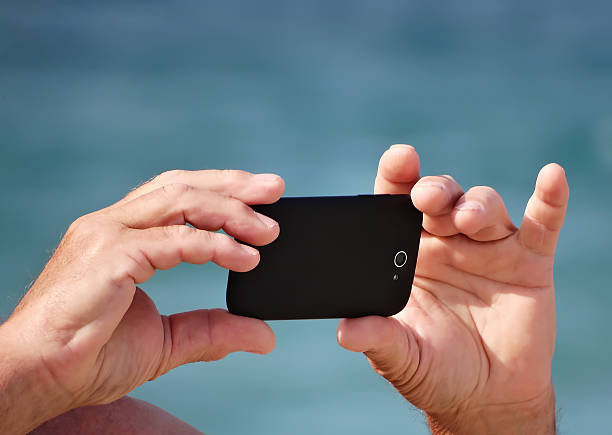 istock Man photographed on the beach 479817682