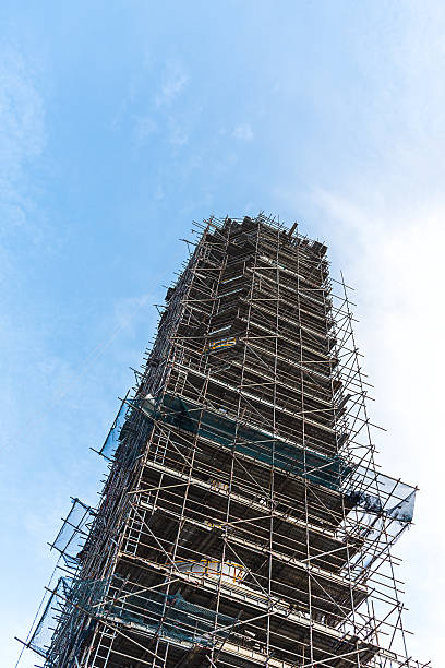istock Assembly distillation tower cover by scaffolding 479818694