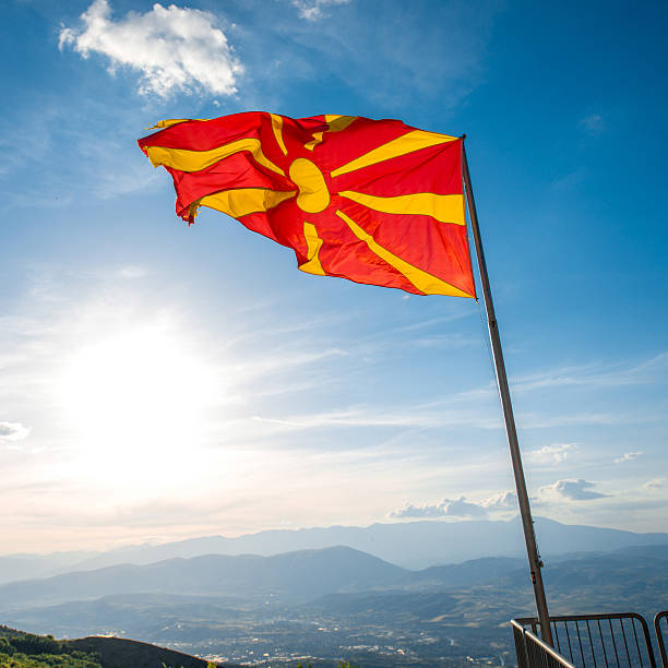 istock Macedonian flag on the sky background 479821580