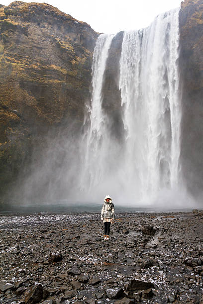 istock Skogafoss woman 479824628