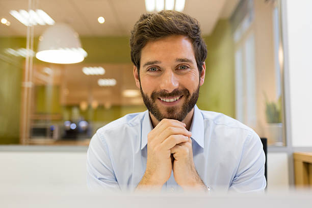 istock Portrait of handsome bearded man in office. looking camera 479824694