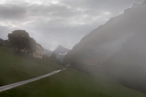 Mountain village in the fog