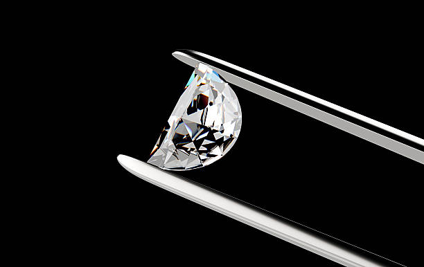 istock Diamond in the tweezers 479825544