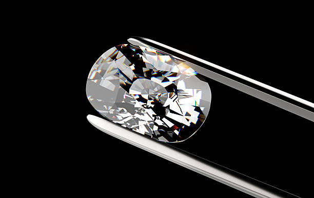 istock Diamond in the tweezers 479825556