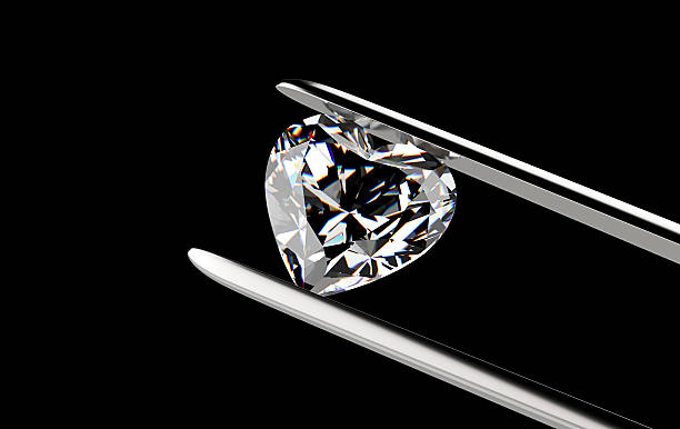 istock Diamond in the tweezers 479825590