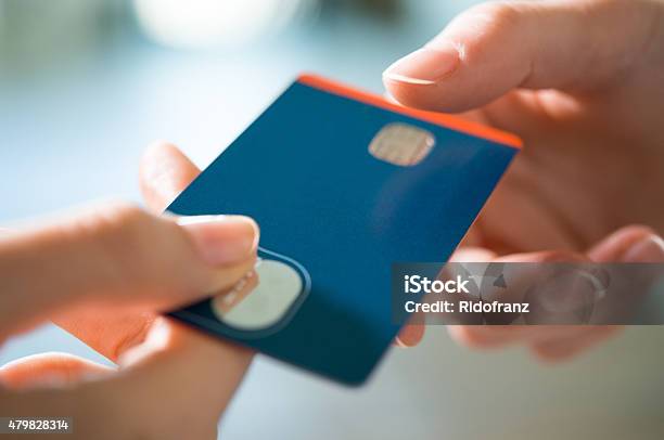 Buying With Credit Card Stock Photo - Download Image Now - Credit Card, Giving, Two People