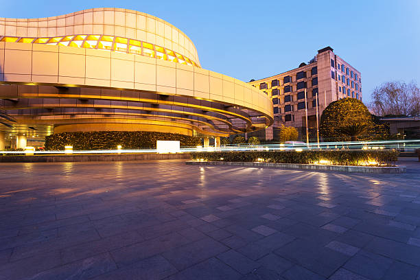 istock Illuminated modern building exterior and  empty street 479830658