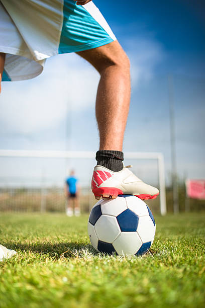 istock soccer player with his ball 479830760