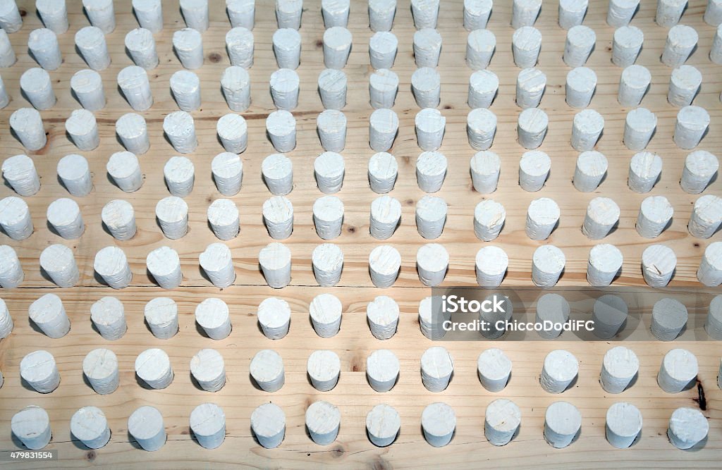Solitaire game made with corks toy Solitaire game made with corks and a wooden panel 2015 Stock Photo