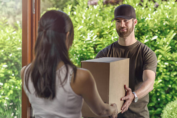 istock Deliveryman making a door to door delivery 479835648