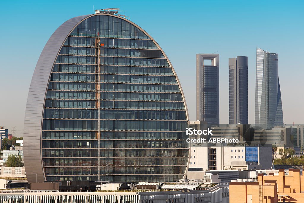 Madrid skyline with four towers and building under construction Madrid skyline with four towers and building under construction. Horizontal Madrid Stock Photo