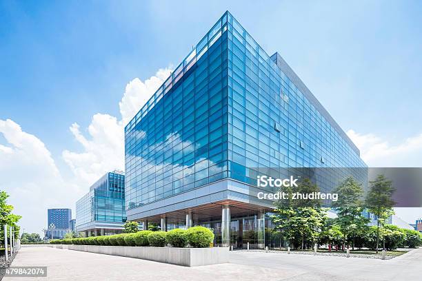 Empty Road At Building Exterior Stock Photo - Download Image Now - Office Building Exterior, Building Exterior, Business