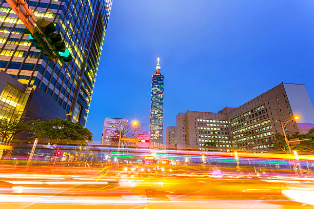 istock traffic light trails in modern street 479844280