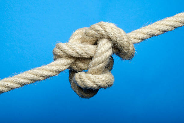 istock Tied Up Stress Knot of Rope or String, Pulled Tight 479844390