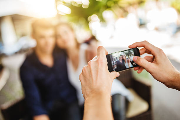 istock taking a picture of the friends 479845004