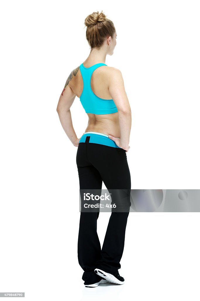 Rear view of sports woman looking away Rear view of sports woman looking awayhttp://www.twodozendesign.info/i/1.png 20-29 Years Stock Photo