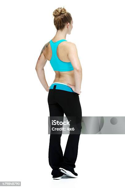 Rear View Of Sports Woman Looking Away Stock Photo - Download Image Now - 20-29 Years, 2015, Adult