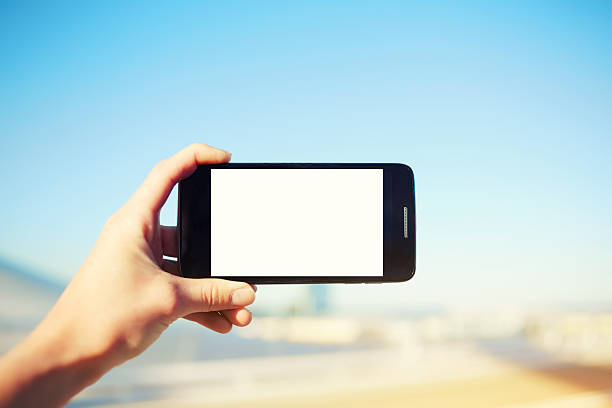 istock Female holding smartphone with blank copy space area 479849208